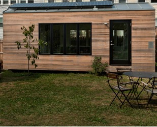 altE store tiny house with solar panels