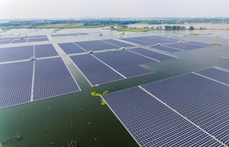 A floating solar array on a large body of water