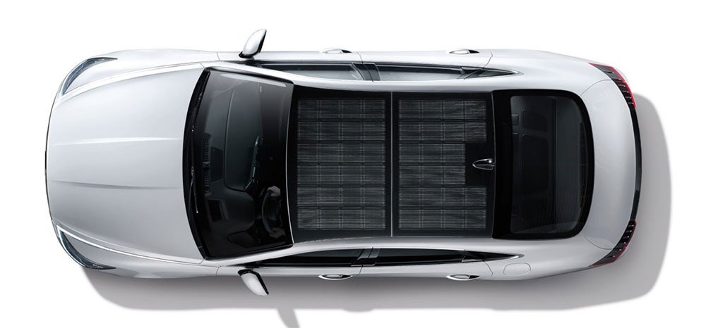 Silver Hyundai solar electric car with roof charging system