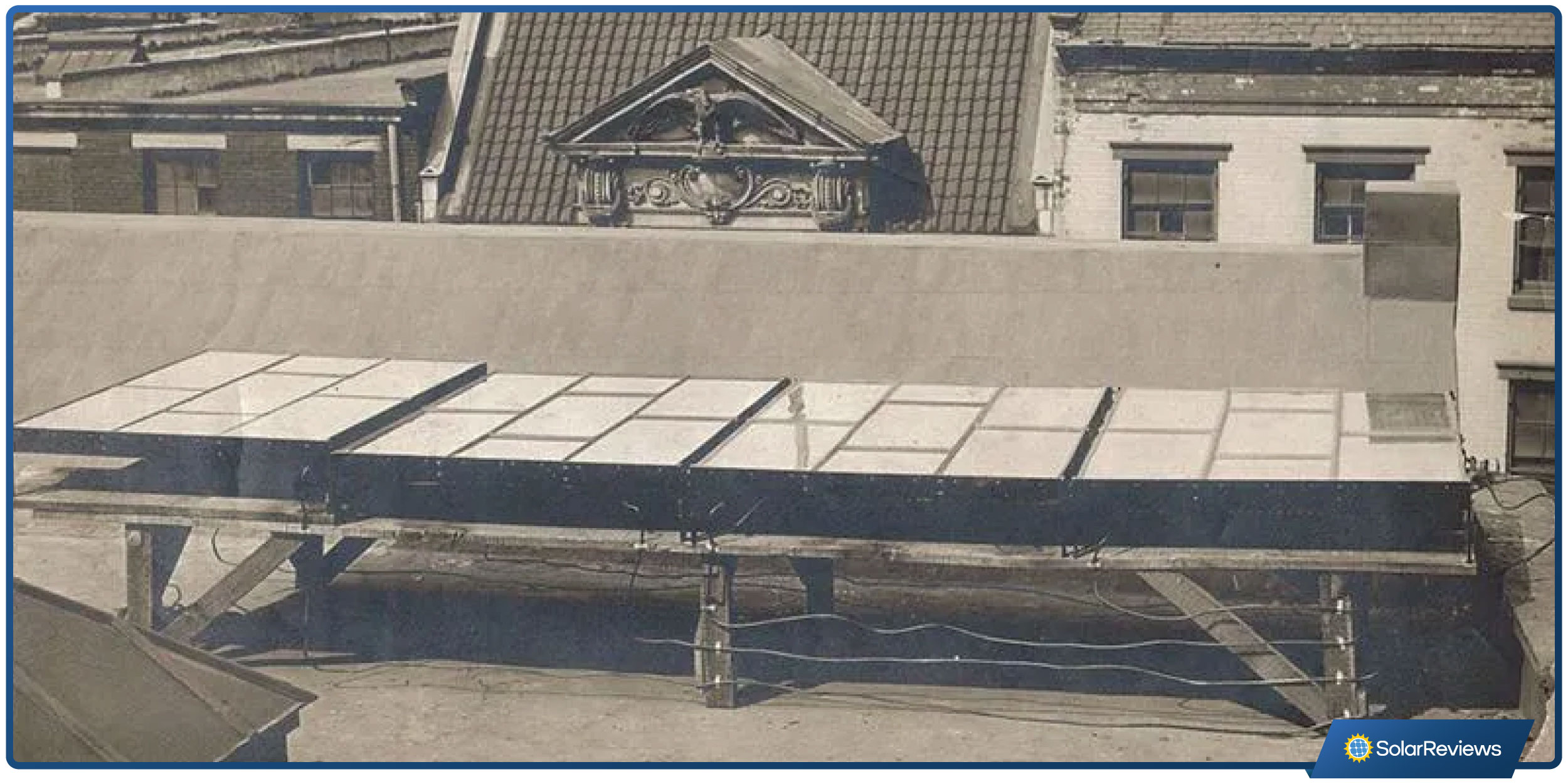 Old photo of the first ever functioning solar panels on a rooftop