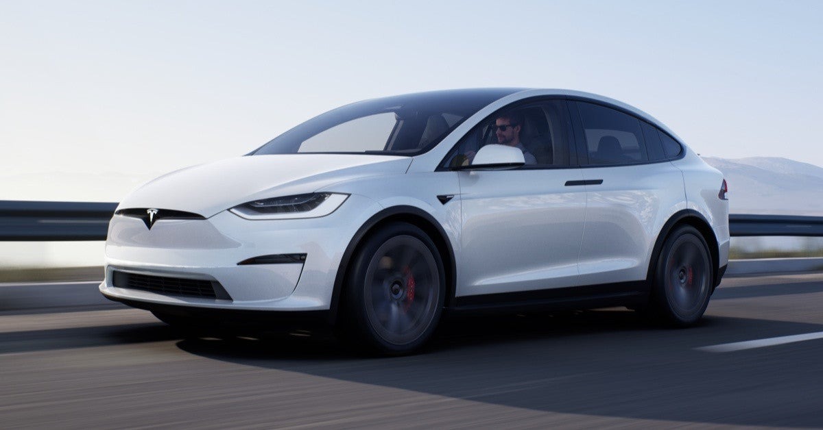 Photo of a Tesla model 3 in motion